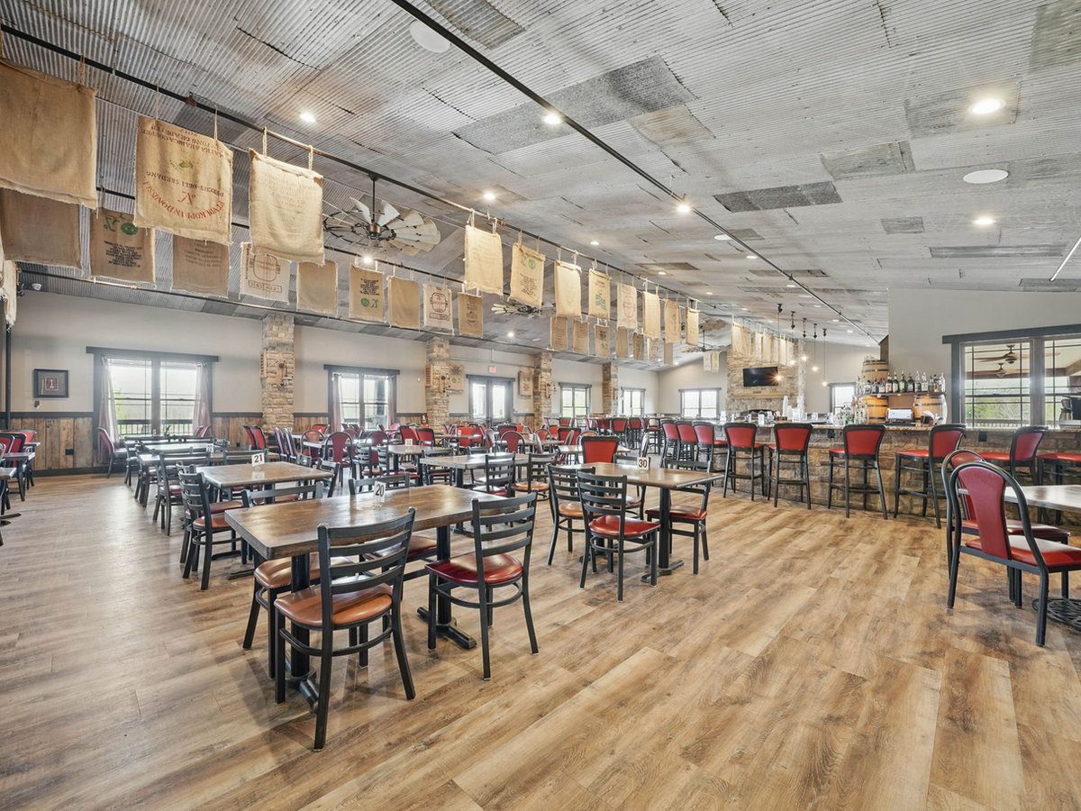 Bride and groom portrait at The Quarry waterfront in New Melle, MO